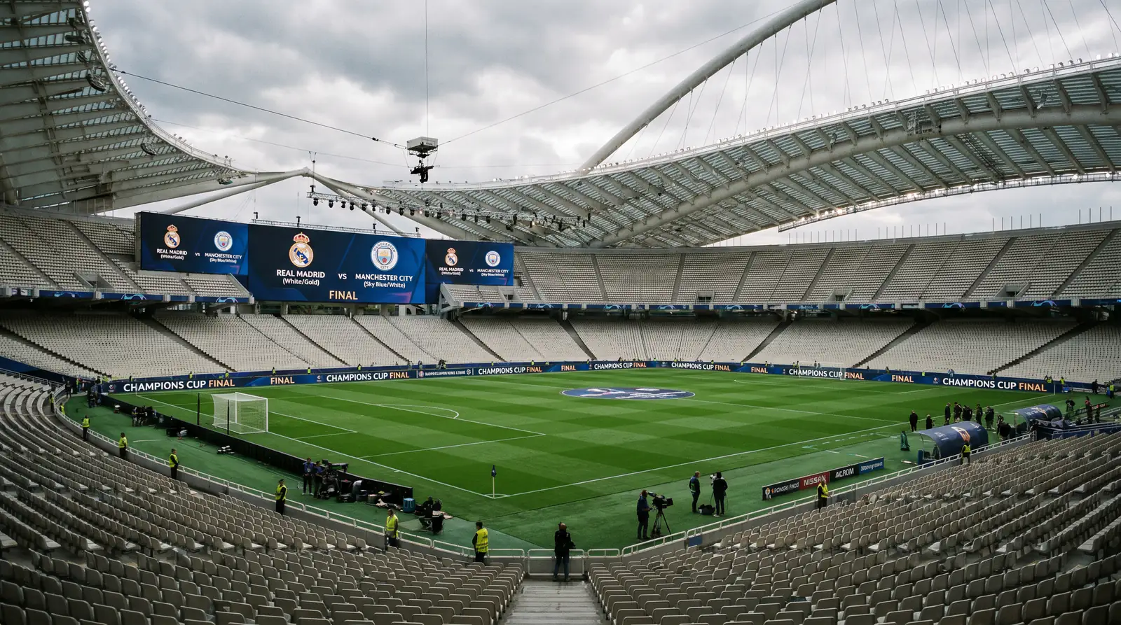 Grand neutral venue prepared for a Champions Cup final with both teams' colours displayed