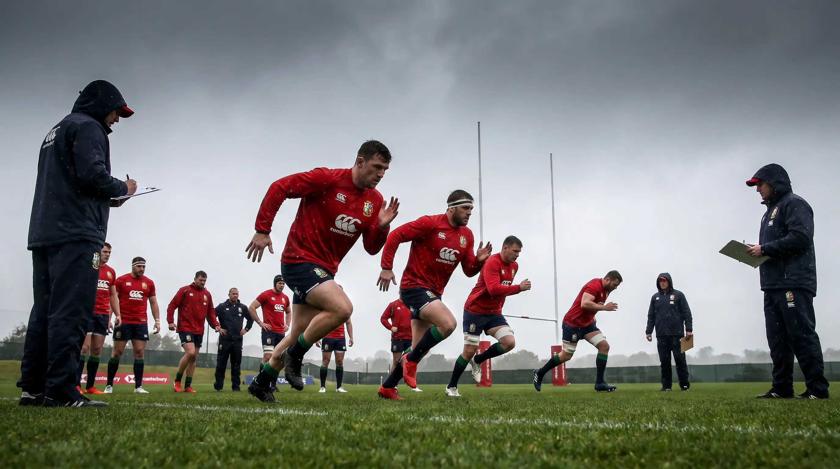 British and Irish Lions squad during a training session with coaches observing drills