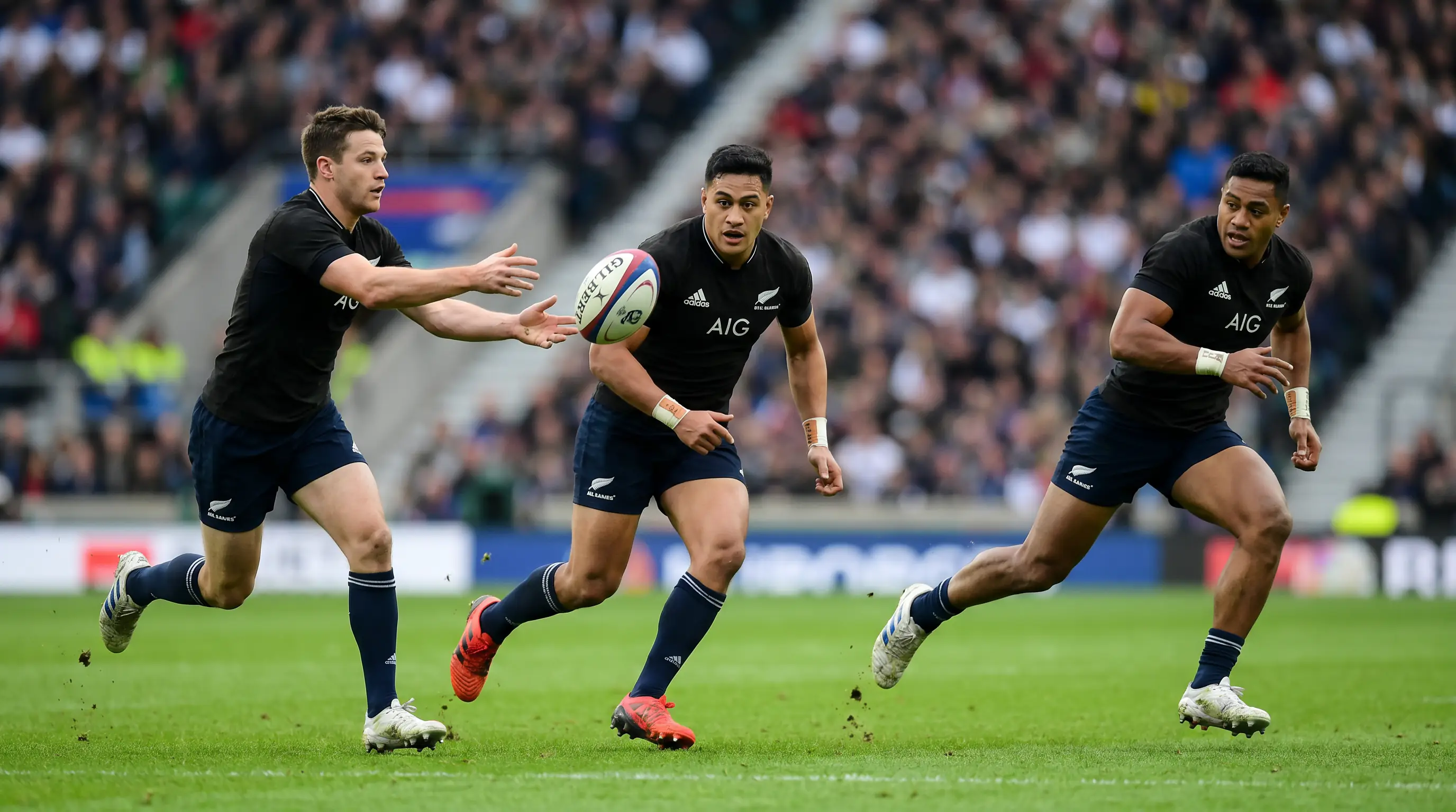 Rugby backline executing an attacking play with the ball moving wide through the hands