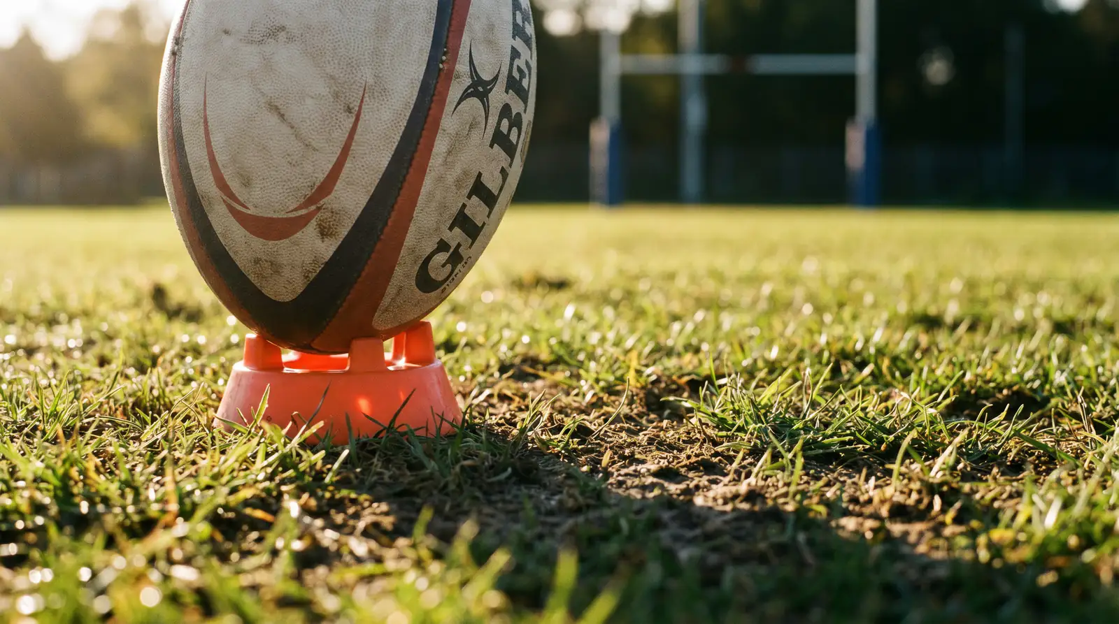 Close-up of a rugby kicking tee with the ball positioned for a goal attempt
