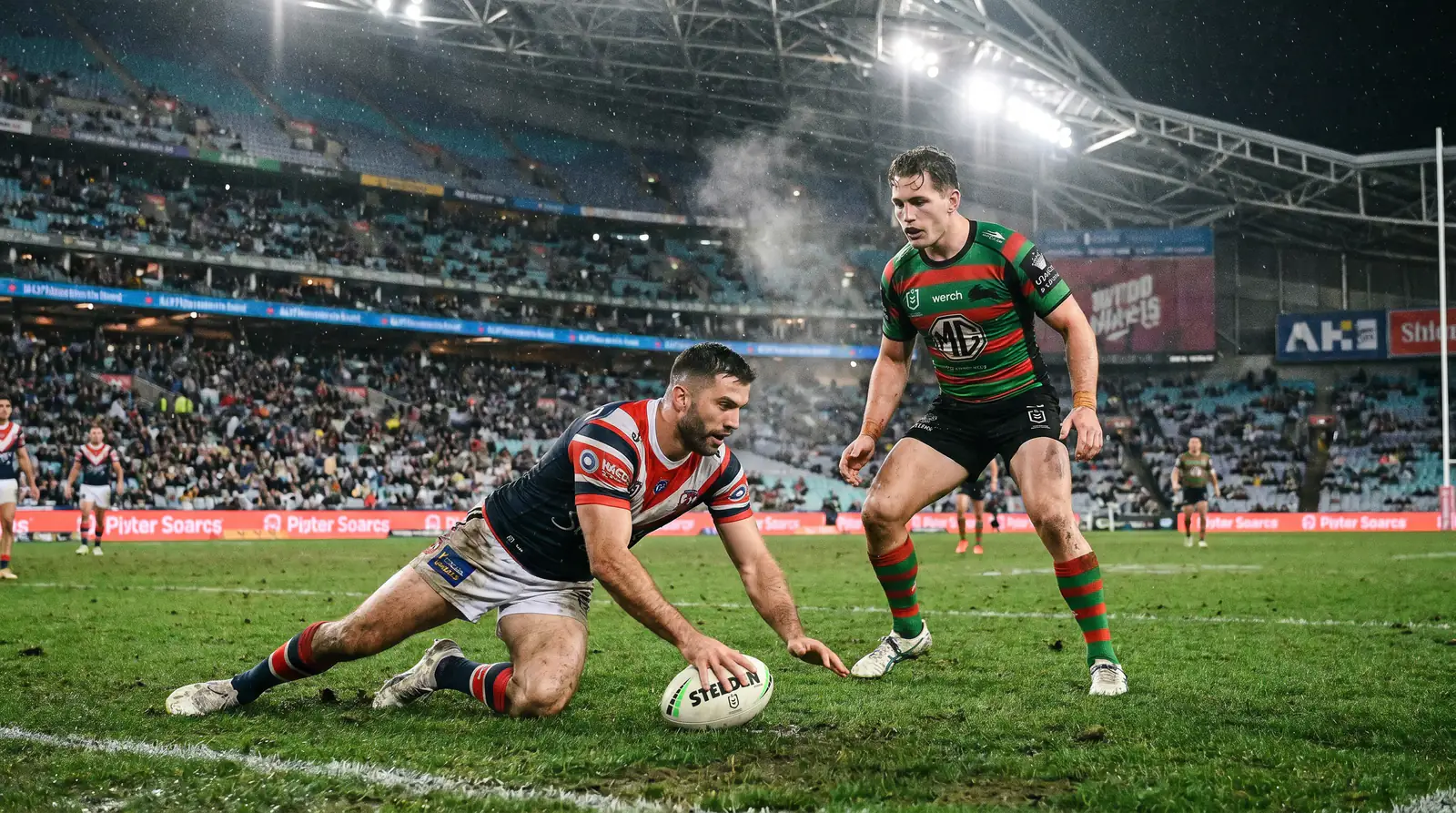 Rugby league player performing a play-the-ball restart with markers set